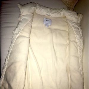 White puffy vest